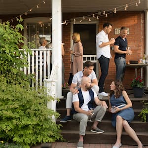 friends hanging out on front porch