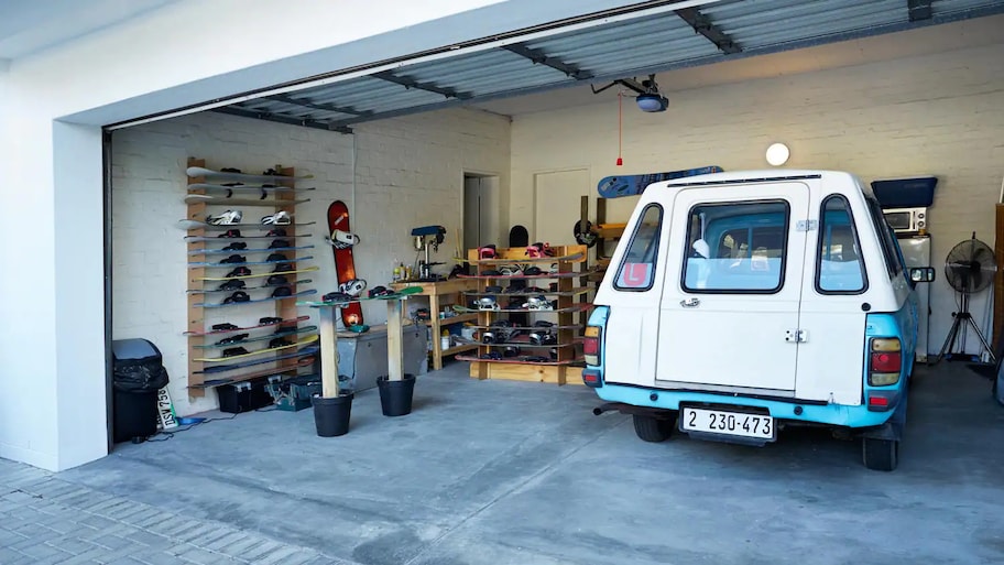 A garage with concrete floor and sandboards