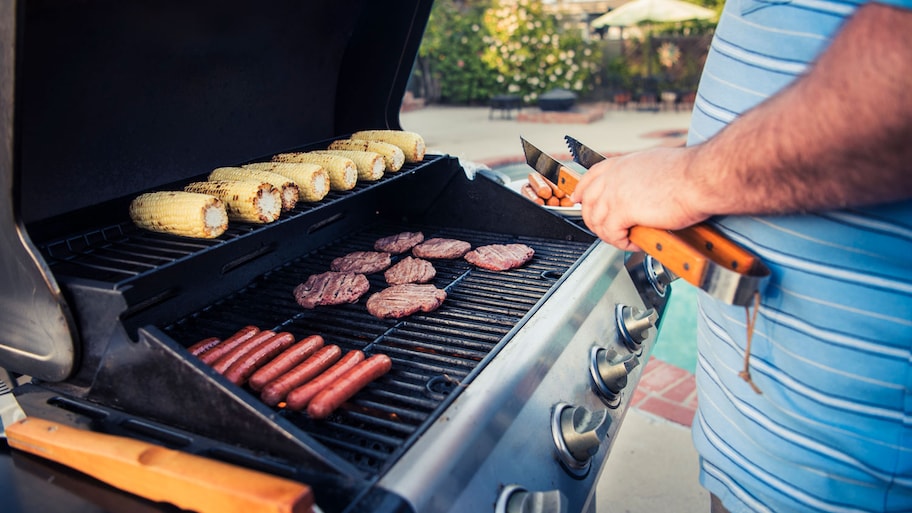 Close up of man grilling