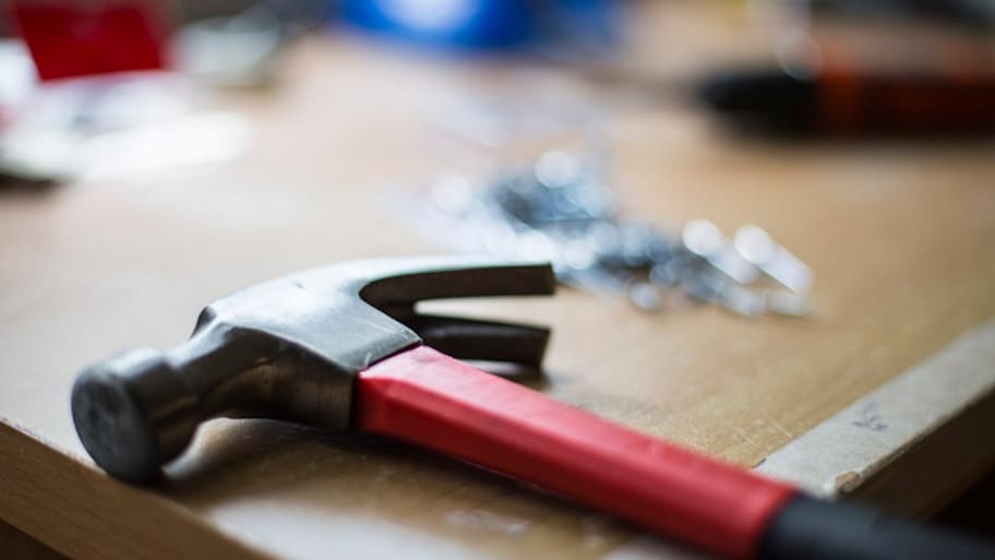 Hammer on table