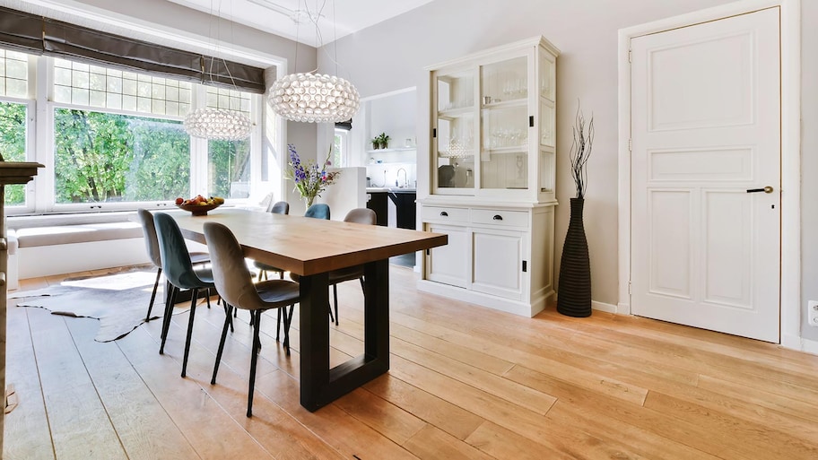 Wide plank hardwoods in dining room