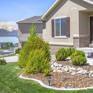 Home with landscaped front yard