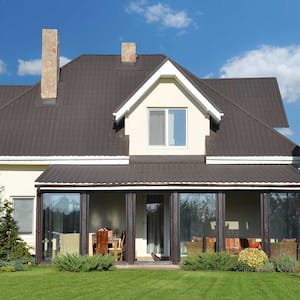 Home with gray roof in a rural area