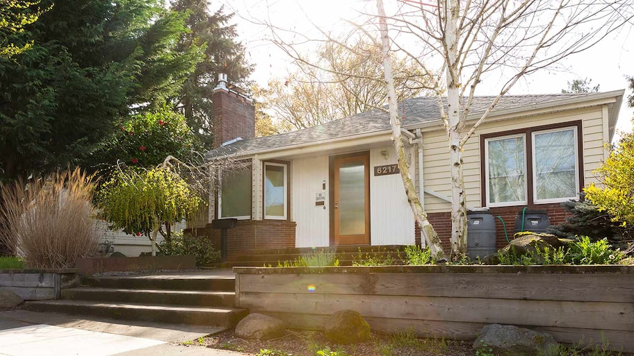 Exterior shot of a bungalow type of house on a sunny day