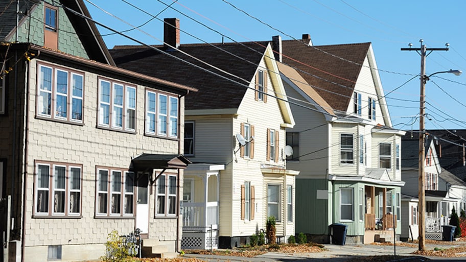 Power lines running in front of houses