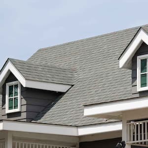 Roof drip edge installed on a house with dormer windows