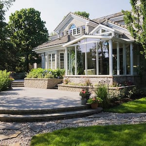 Beautiful home with stone patio and landscaping