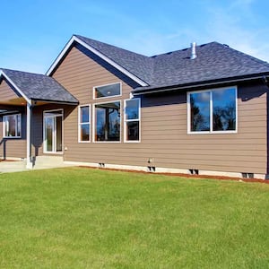 Suburban house with raised foundation and large yard