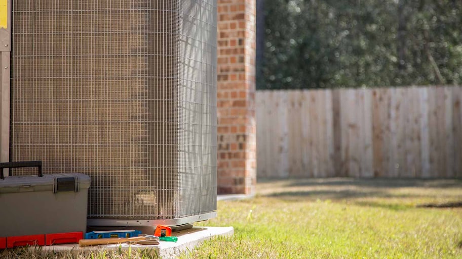 A HVAC unit in the backyard