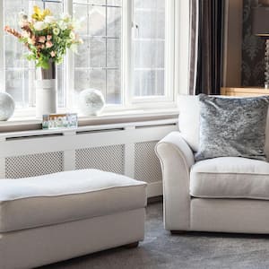 The interior of a carpeted living room lounge