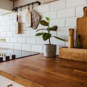 A kitchen with a faux wood countertop