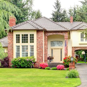 Large suburban home with brick siding