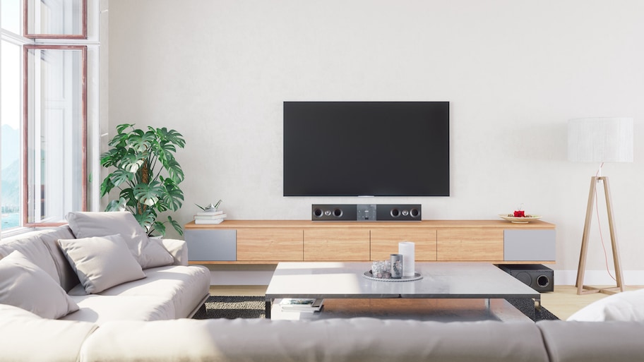 A large TV in a minimalistic living room