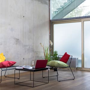 Sitting area in a loft with concrete wall