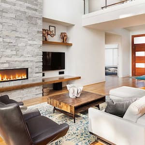Luxury living room with fireplace and high ceiling
