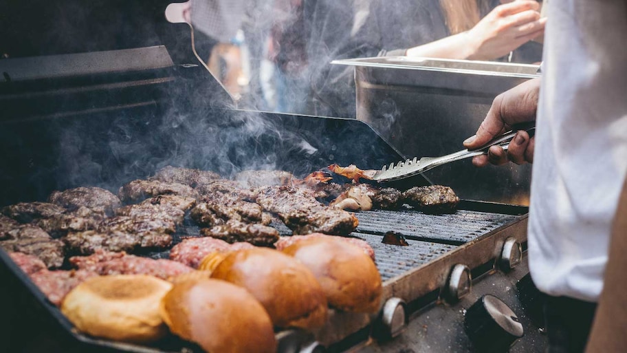 A man grilling meat