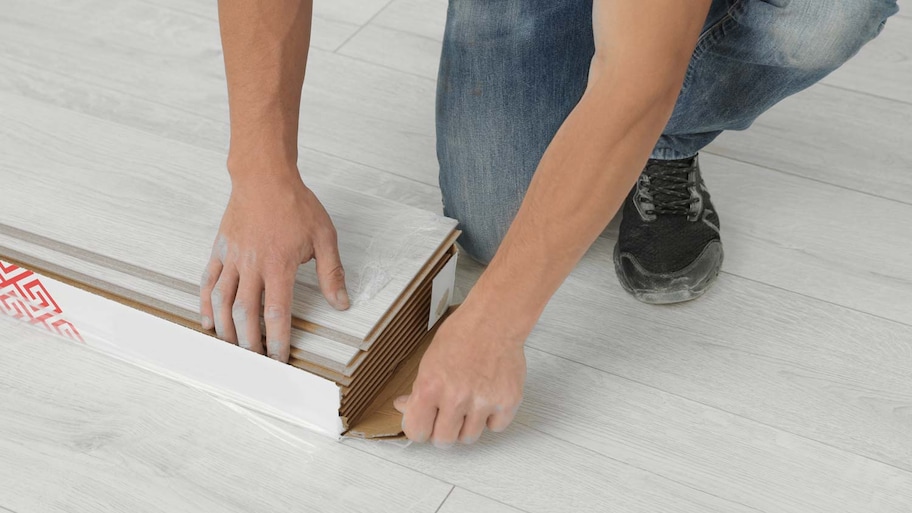 A man packing laminate planks