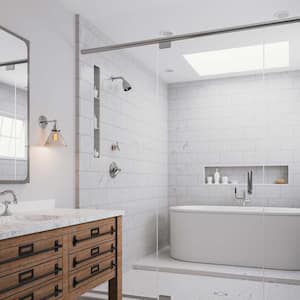 A modern bathroom with a white marble vanity