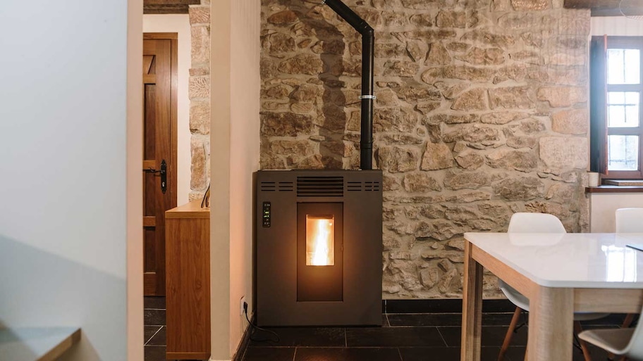 A modern pellet stove inside a house