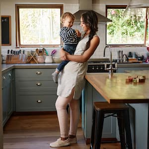 A view of a mother and son in a kitchen