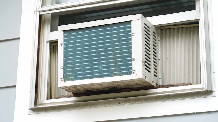 old air conditioner on window