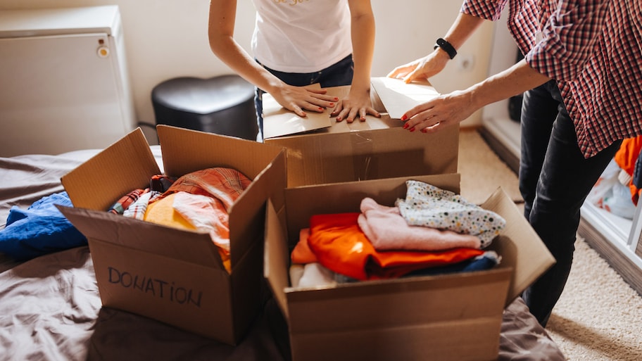 Backing up boxes of clothing in the bed