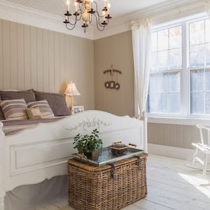 Bedroom with painted paneling