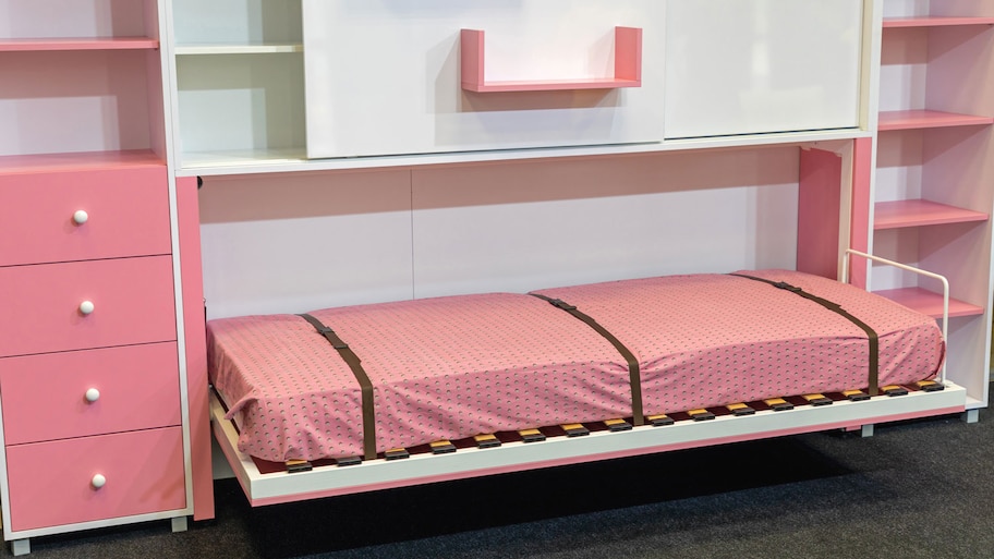 A pink murphy bed in a children’s room