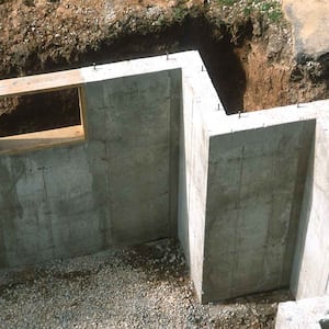 A poured cement foundation wall