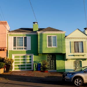 Powerlines running to row of houses