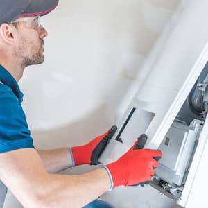 professional cleaning a furnace