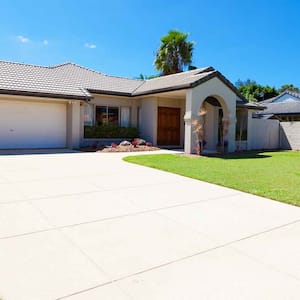 Suburban house with concrete driveway