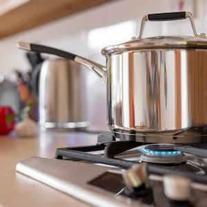 Saucepan on top of a gas burner