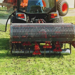 soil aeration machine on lawn