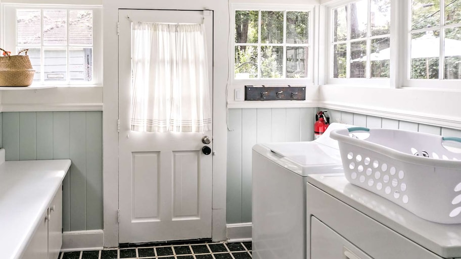 spacious well lit laundry room