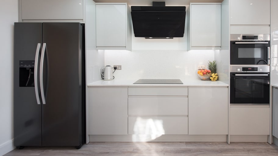 Kitchen with standard size refrigerator