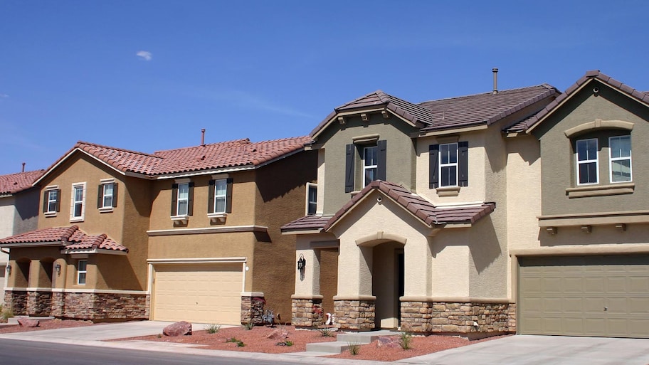 Stucco houses in a row in a new subdivision