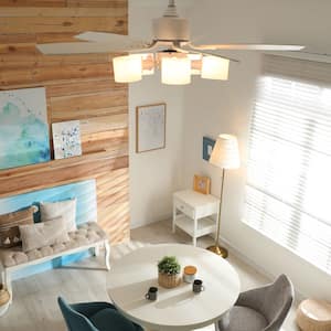 A stylish vintage lounge area with a ceiling fan