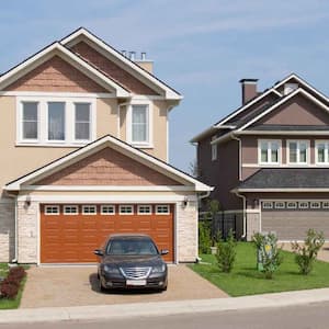  A suburban house with a car parked in the driveway