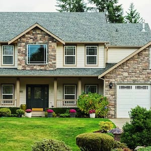 Exterior of a suburban house with visible roof vent