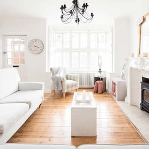A sunny living space with white walls