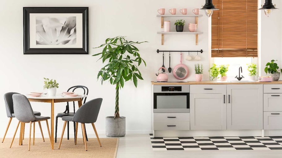 A tile pattern used as an accent border to a tile-to-wood floor transition in a kitchen