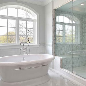 Master bathroom with walk-in shower and a bathtub