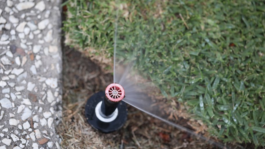 A water sprinkler on the ground