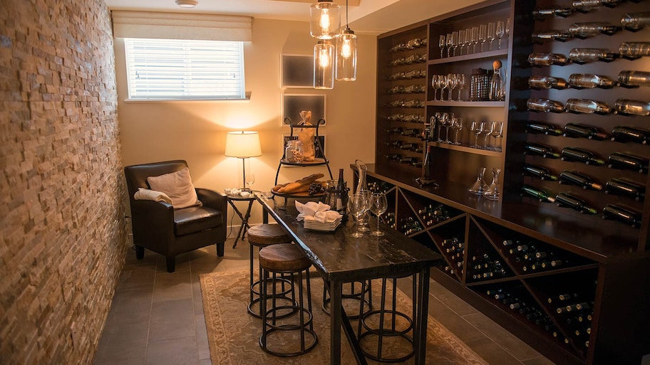 Wine cellar in basement with exposed brick wall