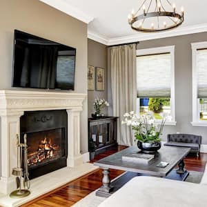 Wood burning fireplace in luxury living room