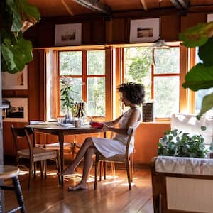 A young woman relaxing in her house 