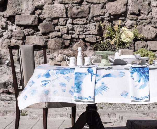 This tablescape—photographed for Tableaus latest Flying Over Rome collection—embraces Grecian colors and plenty of...