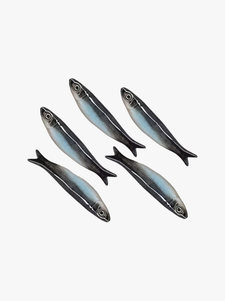 Set of 5 ceramic sardine sculptures.