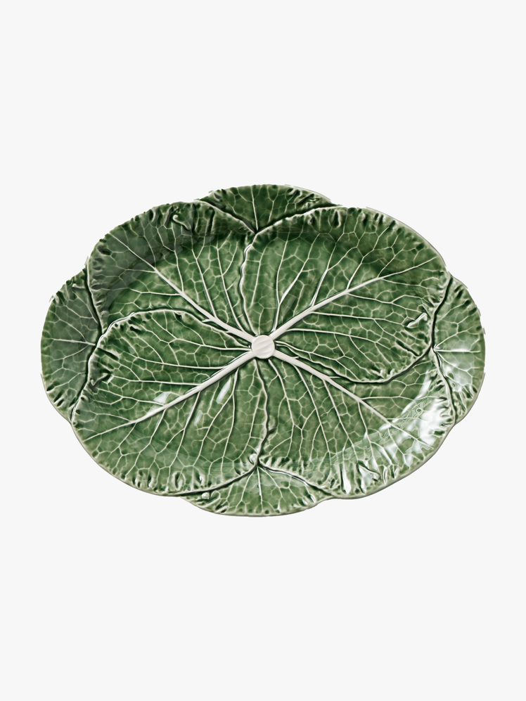 Image may contain Leaf Plant Art Porcelain Pottery Herbal Herbs Food and Meal